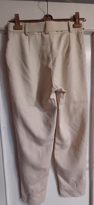 Spodnie letnie w kolorze beżu rozm.L/XL