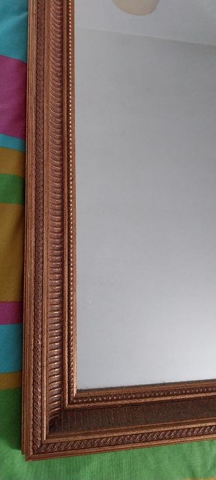 Espelho com moldura
