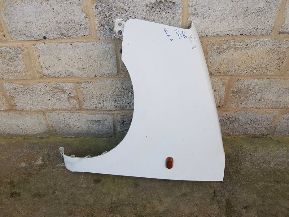 błotnik lewy lub prawy opel agila a, suzuki wagon kod koloru Y474