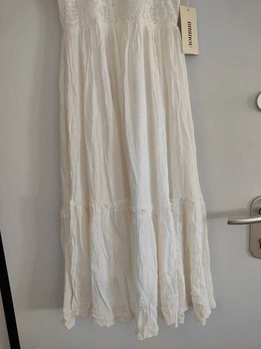 Vestido da marca Bibihou, concebido para uma criança  de 10 anos