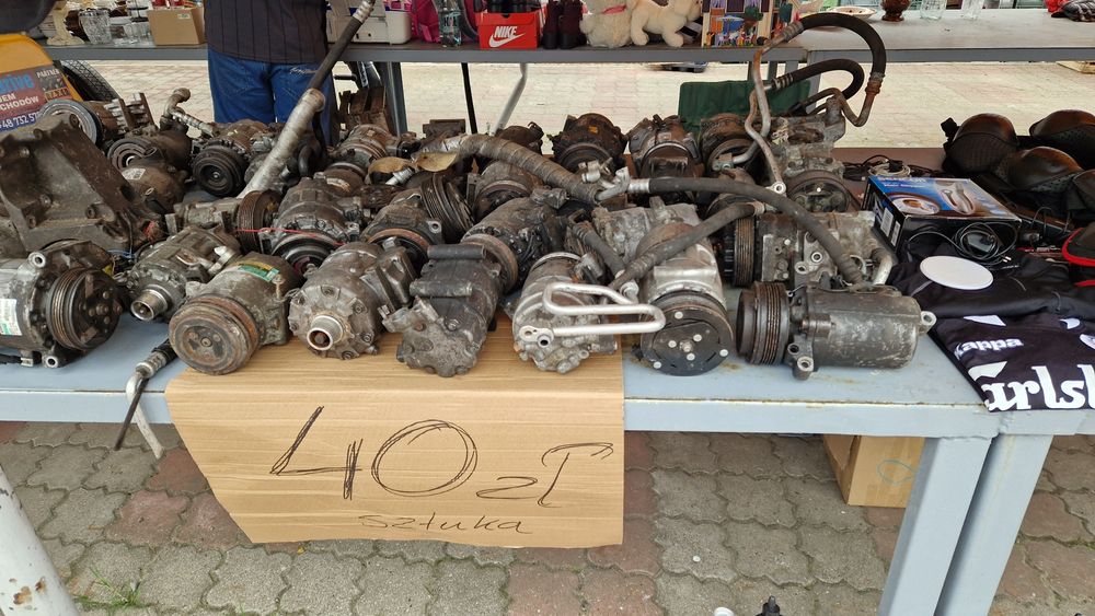 Ubrania na rower, kompresory klimatyzacji itp.