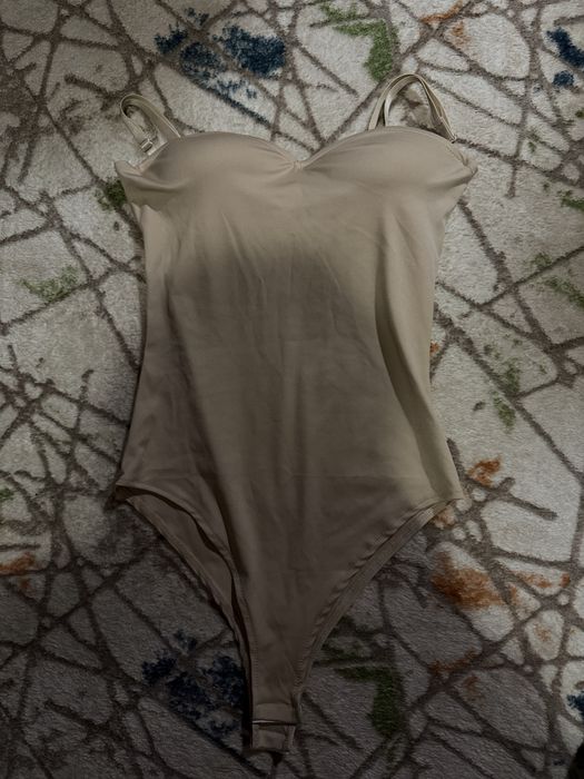 Продам боді бежевий