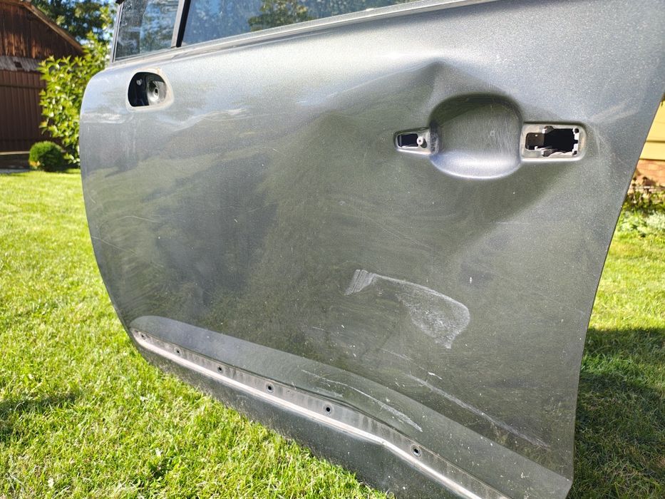 Дверка ліва (водійська ) Пежо 5008 2010