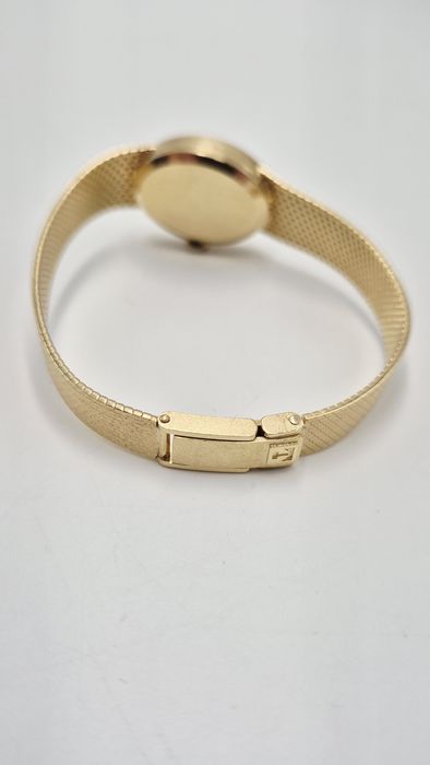 Złoty  Damski zegarek Tissot próba  750