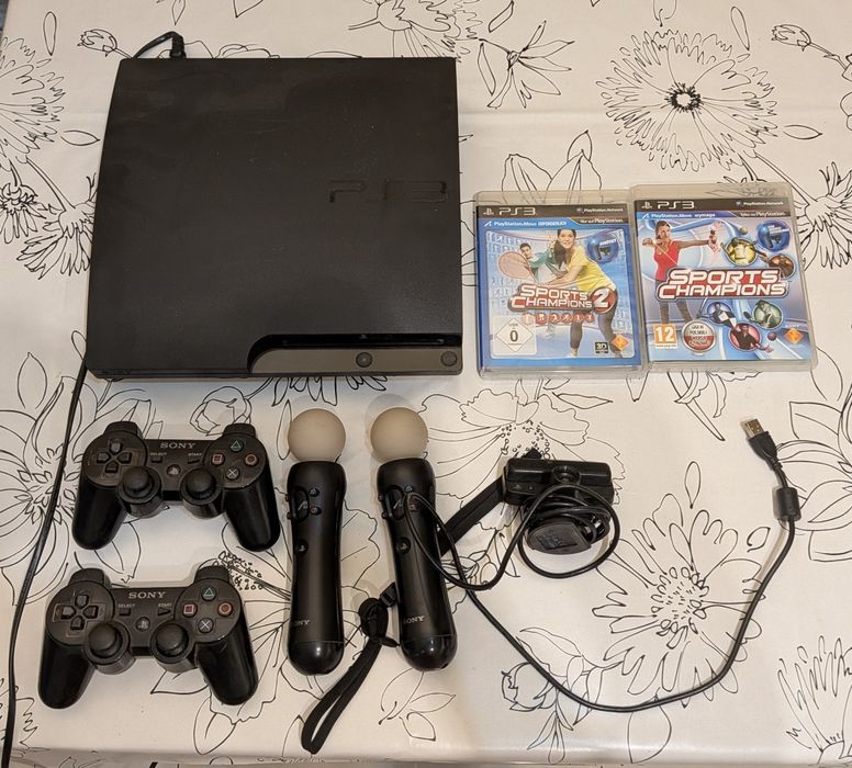 PlayStation 3 Slim 320GB + 2 Pady + Zestaw PS Move + 2 Gry (Sports Champions)