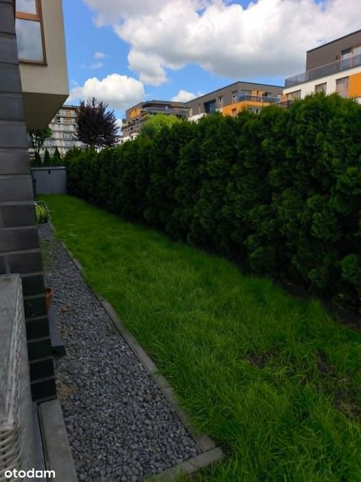4-pokojowe mieszkanie z ogrodem, tarasem, miejscem w garażu i komórką