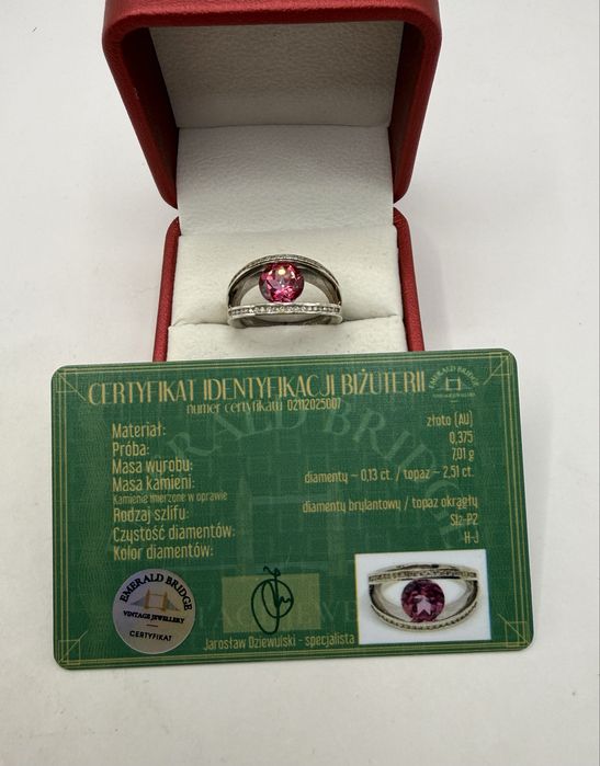 Złoty pierścionek z topazem 2,51ct i diamentami 0,13ct