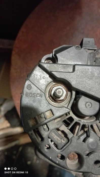 Генератор Бош Опель Віваро 1.9
