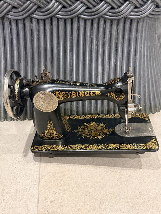 Maquina de costura singer antiga