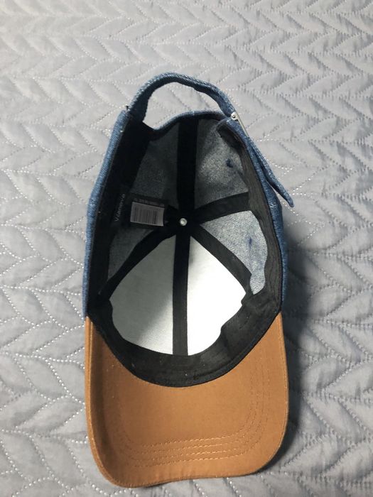 Boné azul ganga e castanho vilanova