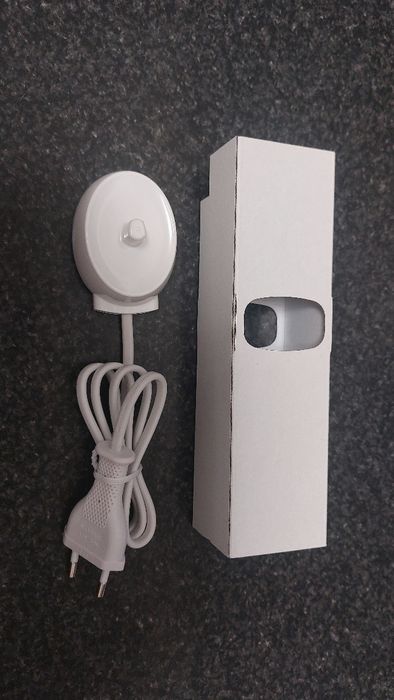 Carregador de escova elétrica  oral b - Novo