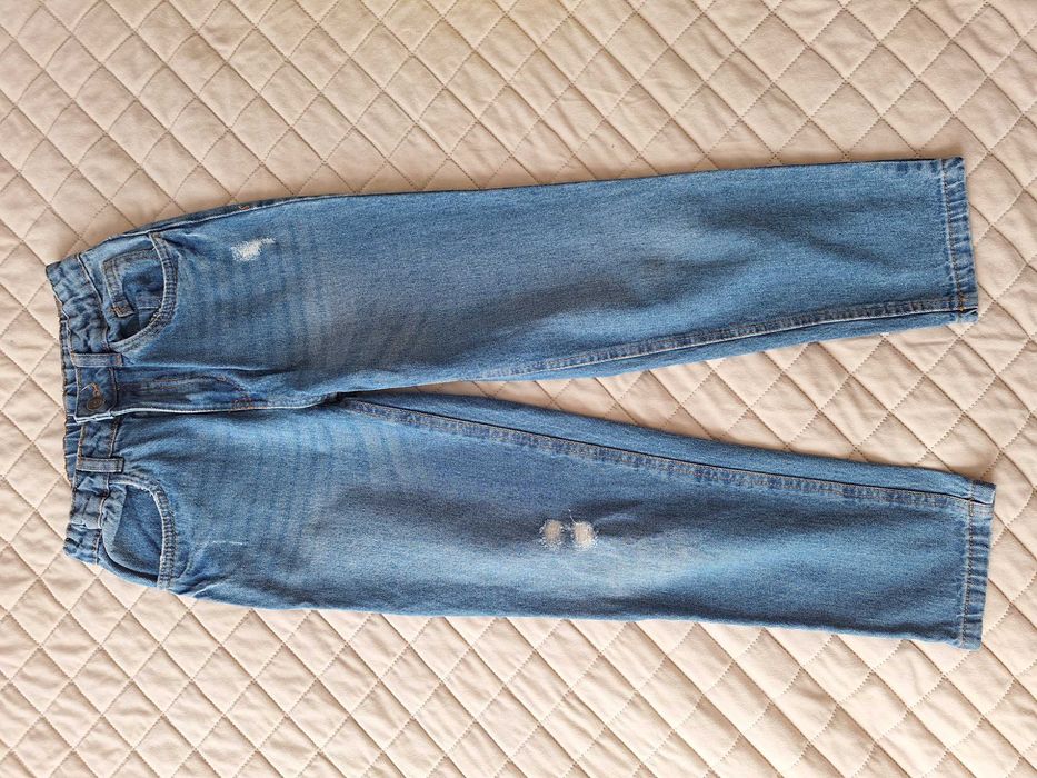 Jeansy boyfiend z przetarciami r.152