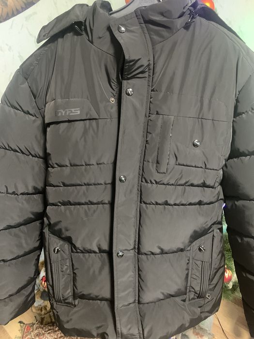 нова чоловіча зимня куртка