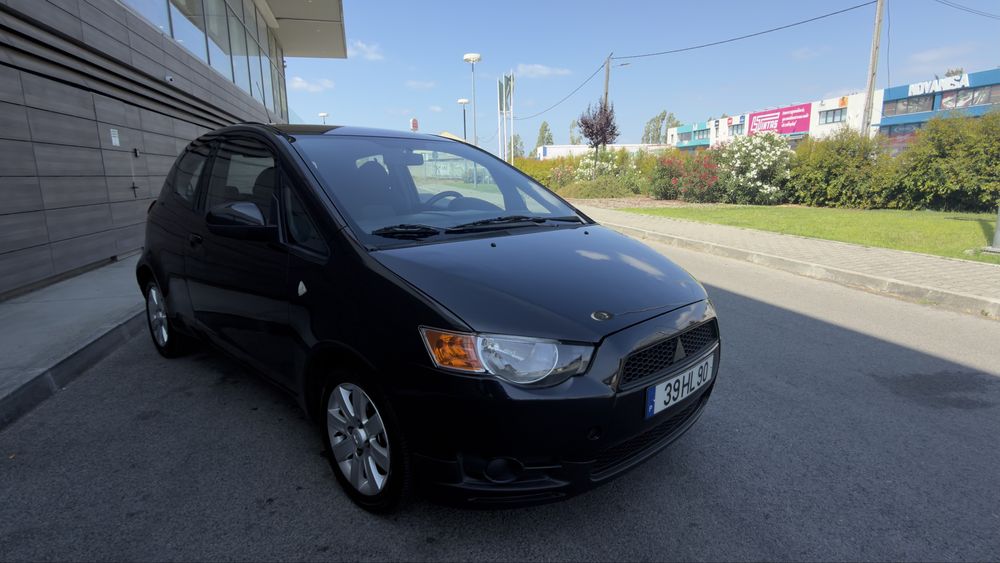 Mitsubishi colt Ar condicionado