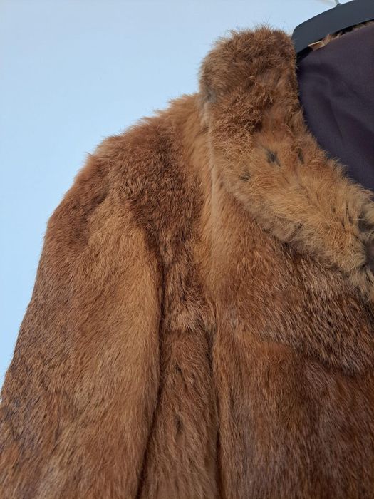 Casaco de pêlo castanho