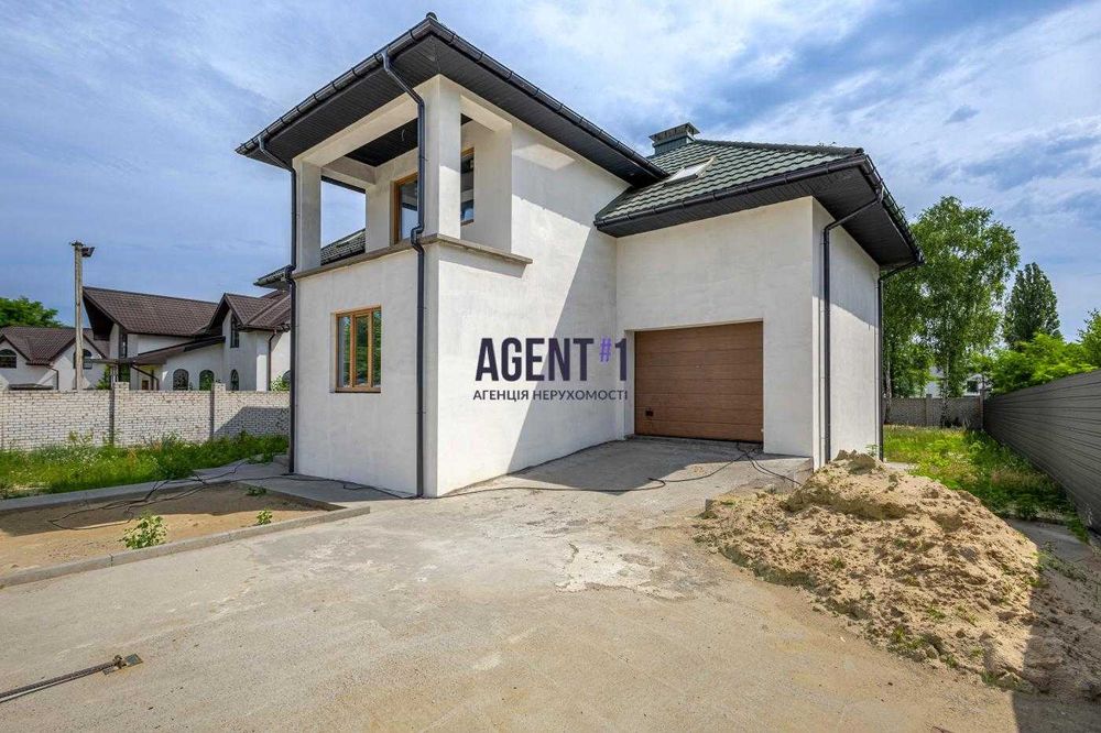 Будинок з укриттям і гаражем, 440м2, ділянка 12 соток.