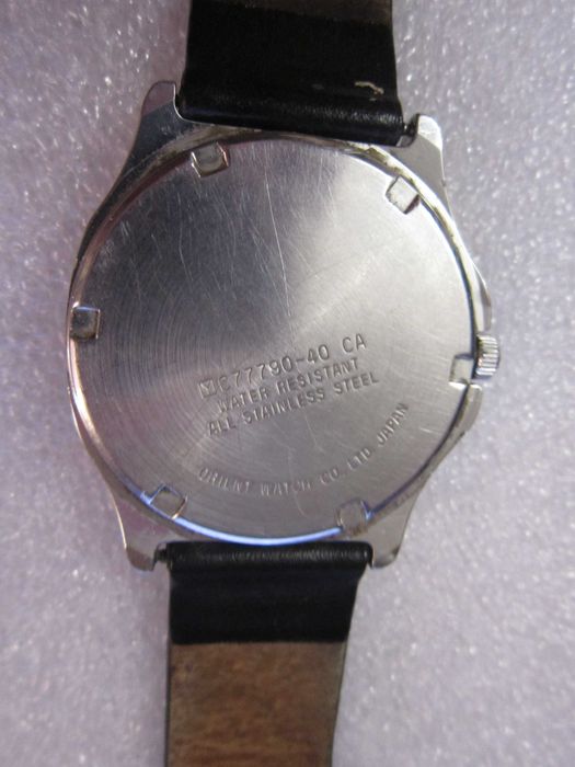 Zegarek męski Orient C7.77.90 40 Japan Szkiełko porysowane