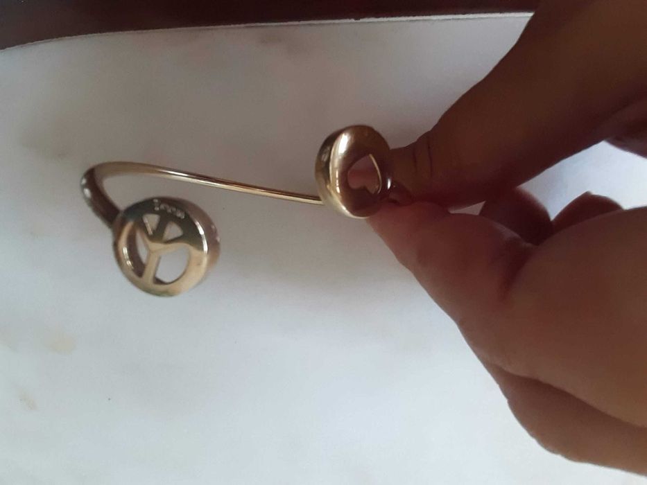 Pulseira prata dourada Woo's, nunca usada, na embalagem original