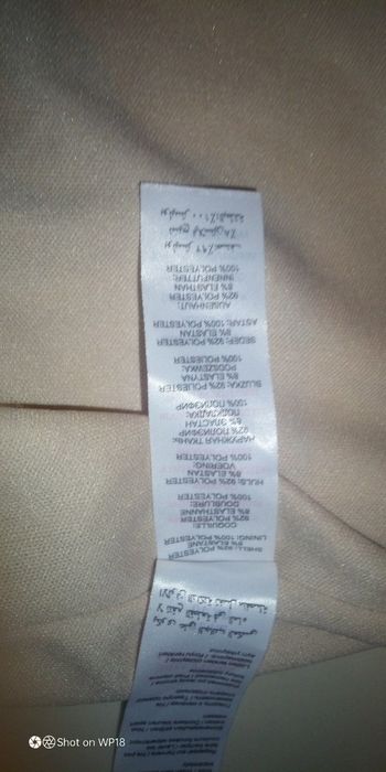 Sukienka W panterkę z cekinami