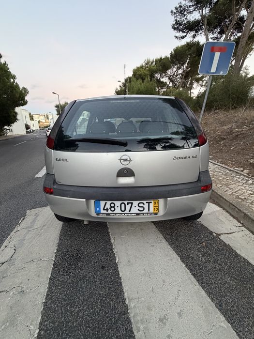 Opel Corsa 1.2 c/ teto de abrir — photo 3