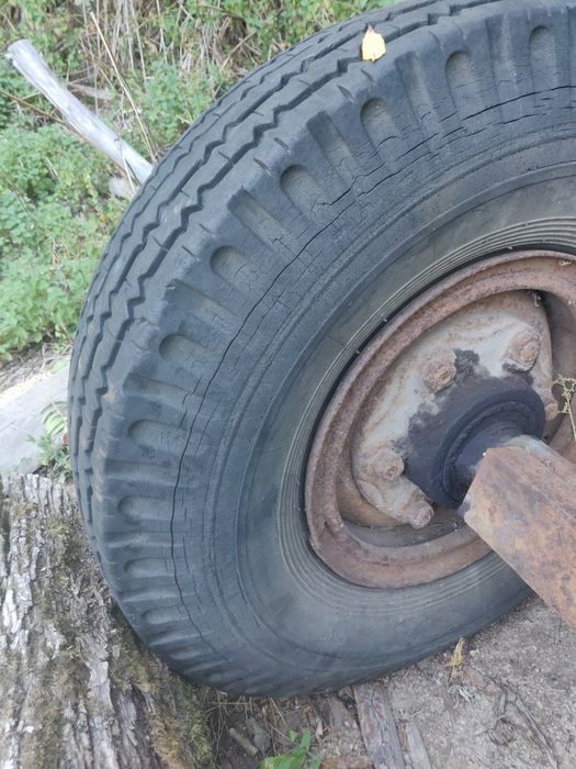 Ось для прицепа с колёсами