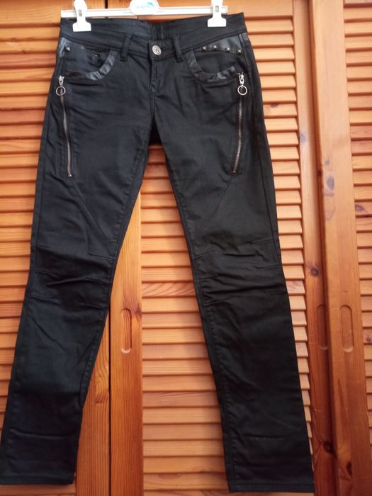 Świetne spodnie Reactive r. L woskowane z imitacją skóry