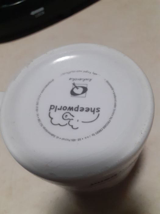 Kubek z ciekawa sentencją