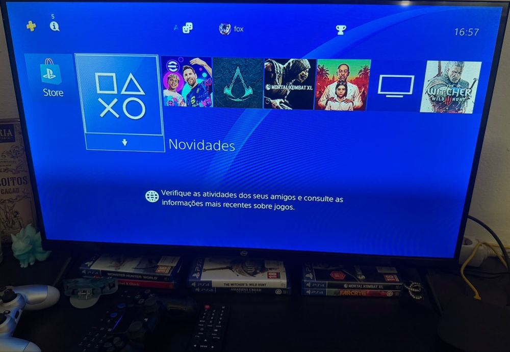 Vendo ps4 slim 1000g c/ 2 comandos e 6 jogos