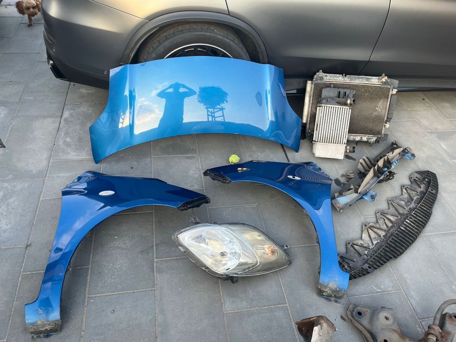Toyota Yaris II maska błotnik pas przedni  8T7 chłodnice 1.4 d4d