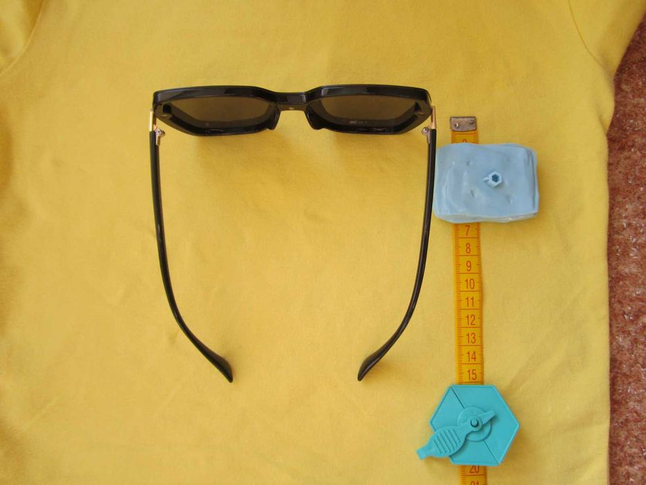 Очки солнцезащитные Consul Polaroid.