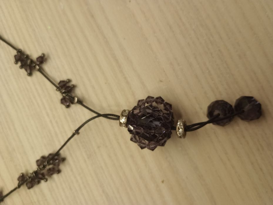 Wisiorek z fioletowym kamieniem