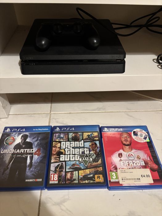Playstation 4 + comando + jogos