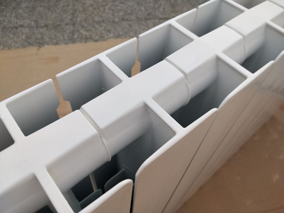 NOVO a ESTREAR Radiador AQ. Central BAXI-ROCA 12 elementos