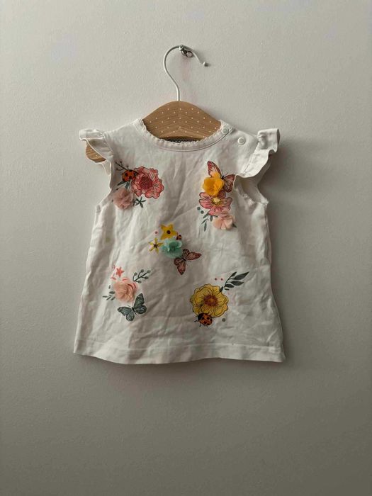 Bluzka Coccodrillo r. 68 cm krótki rękaw biała w kwiaty zapinana napy