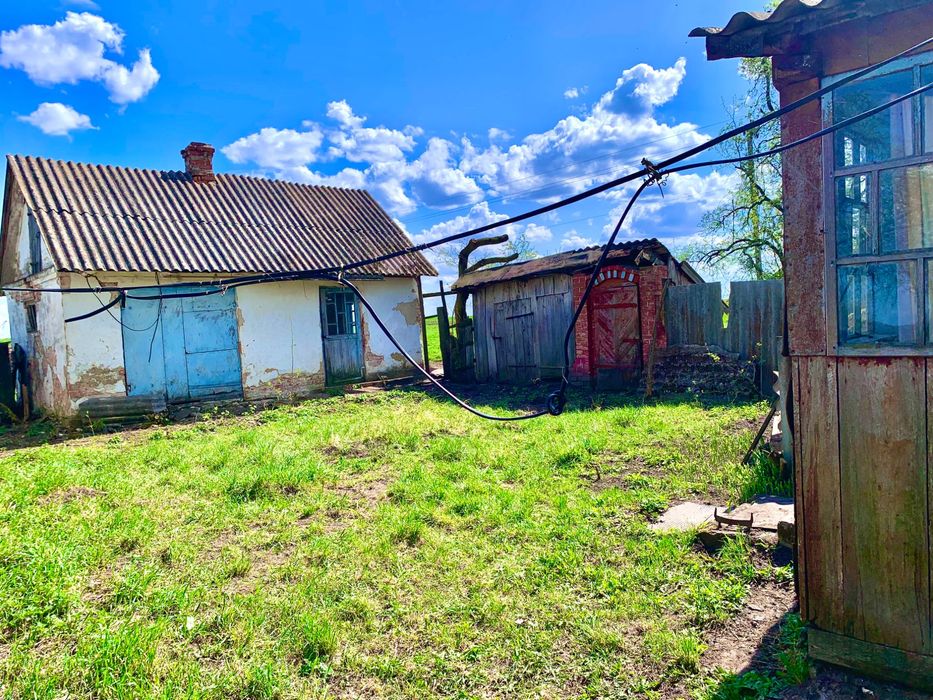 Земельна ділянка з будинком