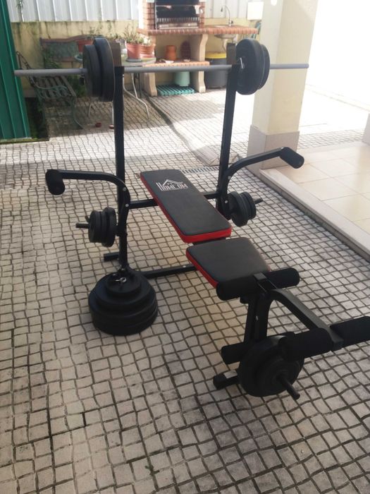 Banco de Musculação completo, (como Novo) com muitos pesos.