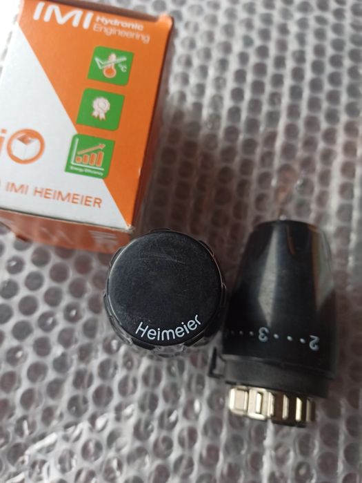 Термоголовка на радиатор отопления Германия