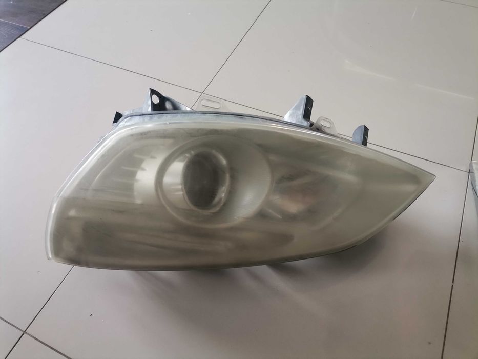Reflektor lewy Renault Scenic II LIFT soczewska 0E