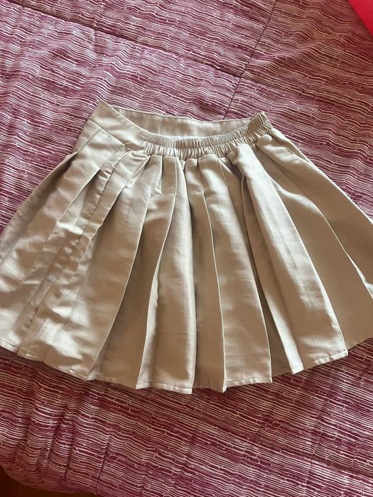 Mini saia com pregas
