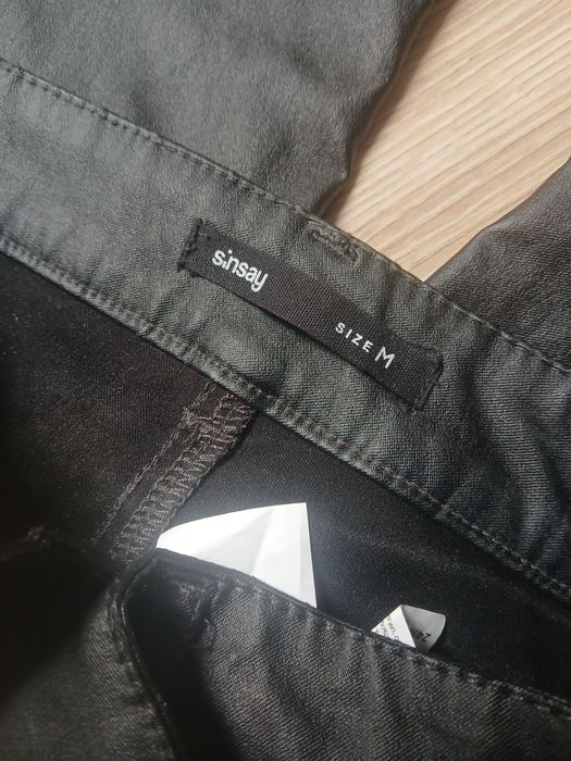 Czarne woskowane spodnie rozszerzane dzwony sinsey r.M