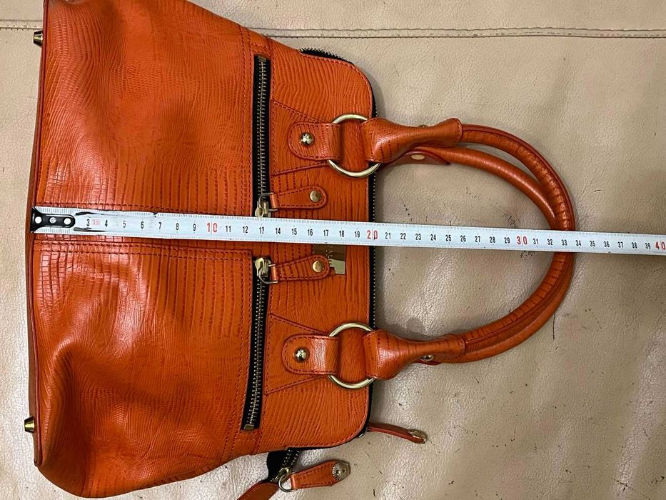 не велика помаранчева шкіряна сумка Modalu