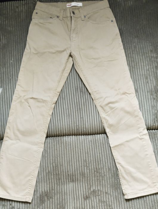 Levis 511 slim fit beżowe chinosy