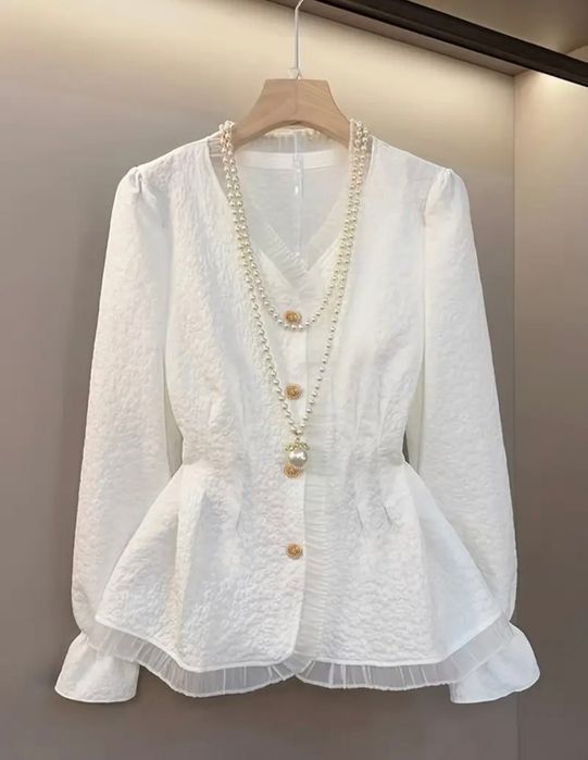 Блузка біленька..