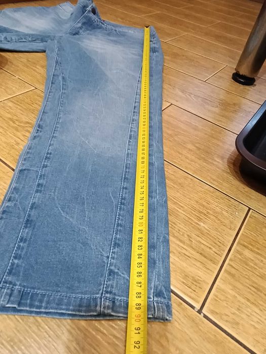 Spodnie 7/8 jeansy damskie niebieskie 44