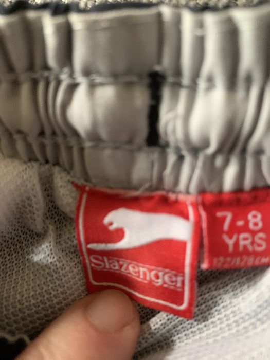 Spodnie z rozpinanymi u dołu nogawkami  7-8 lat