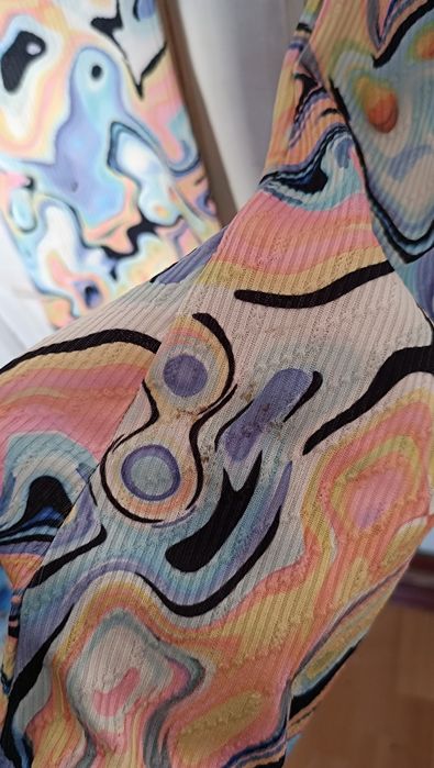 Яскраві кльош штані