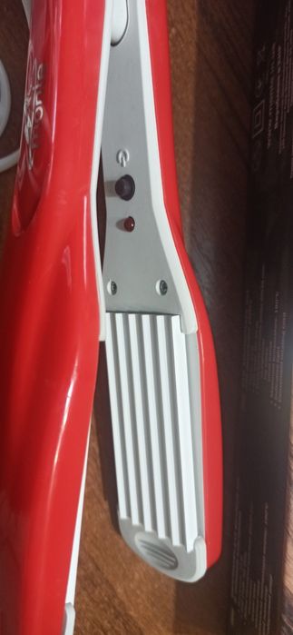 Вирівнювач  для волосся