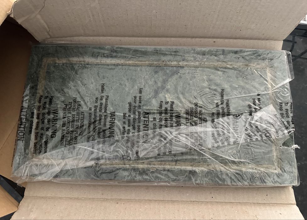 Conjunto pedra de grelhar com embalagens e instruções