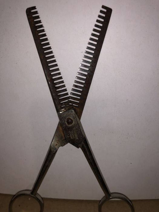Tesoura antiga de barbeiro