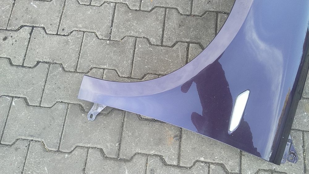 ) Lancia Ypsilon błotnik przedni lewy